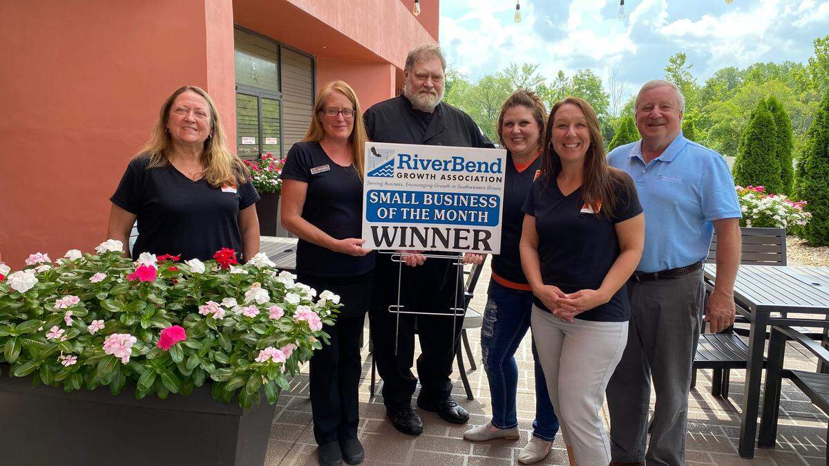 Pictured left to right: Patty Rotermund, Jennifer Martin, Chef Kenny Jaskiewicz, Chelsea Jones, Jacinda Dunlap of Great Rivers Tap & Grill, John Keller of RiverBend Growth Association