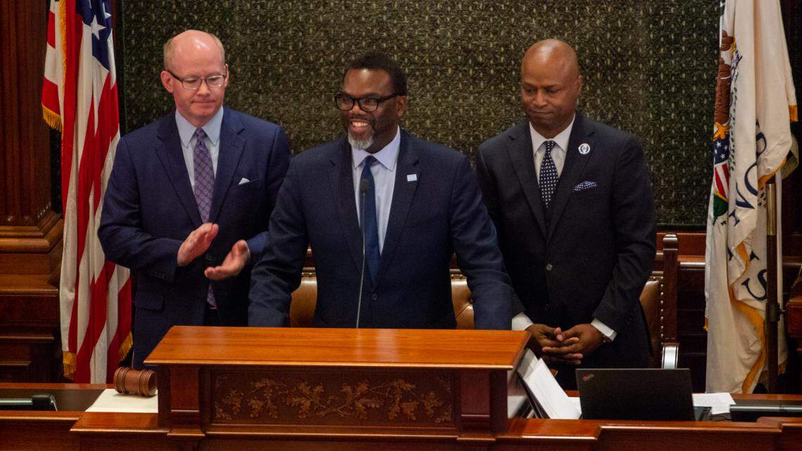 Chicago Mayor-elect Brandon Johnson (center) delivers an address to a joint session of the General Assembly Wednesday in the Illinois House chamber. He is pictured with Senate President Don Harmon, (left) D-Oak Park, and House Speaker Emanuel “Chris” Welch, D-Hillside.
