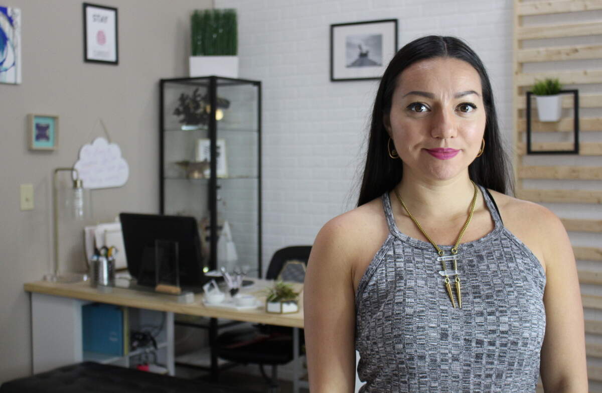 Marianeth Crockett, 31, is the owner of MCIDEATIVE, a business that combines design, branding and photography in downtown O'Fallon.