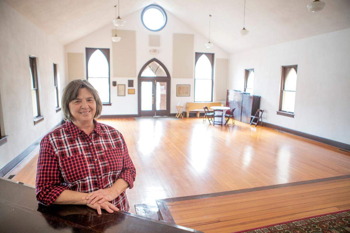 Jeanne Bullard, president of Mascoutah Cemetery Chapel, Inc., and her merry band of volunteers are preparing Espenschied Chapel in Mascoutah for a Judy Collins concert on Dec. 2. The organization will bring in a Steinway grand piano and set up about 100 padded folding chairs.