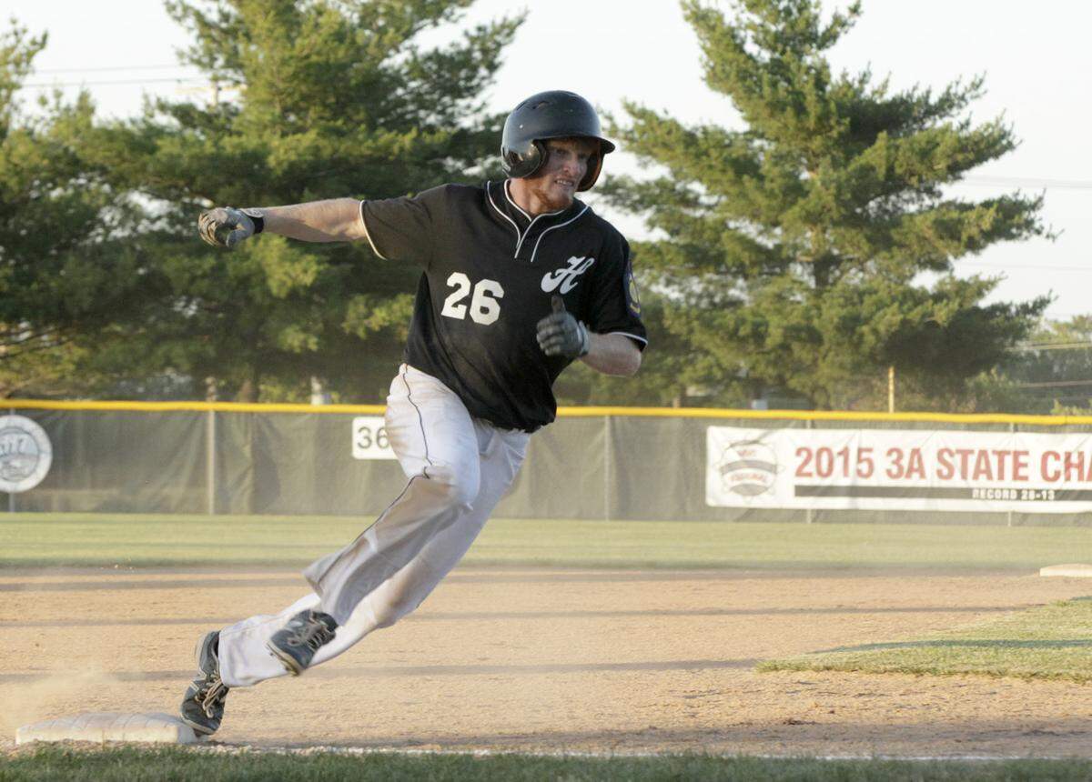Brock Troxell rounds third base in Highland American Legion Post 439's first game of the season verses Belleville at Glik Park.