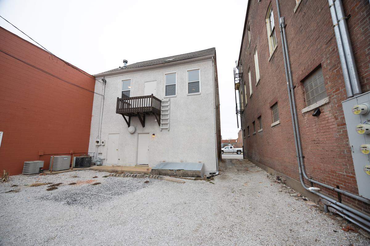 The rear of the property at 204-206 West Main Street in Belleville, where private parking is available to residents and guests.
