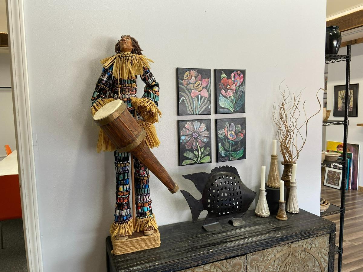 Art Gecko Studio has expanded to larger quarters, with an art gallery featuring work by other artists. This is a room for art classes with a work from a watercolor class hanging up.