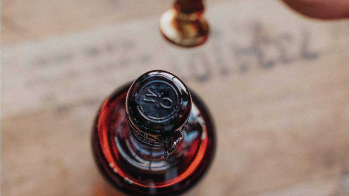 Each bottle of the Withered Oak Straight Bourbon and Rye whiskeys is hand-stamped.