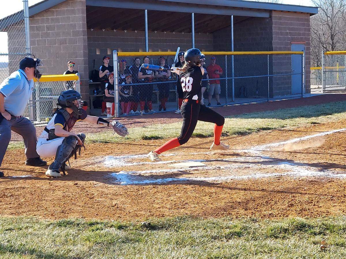 Highland junior Maggie Grohmann slaps a pitch toward left field during a non-conference game against O’Fallon earlier this season. Grohmann and her teammates finished 22-10 this spring while capturing the Mississippi Valley Conference championship and advancing to the IHSA Class 3A super-sectional round.
