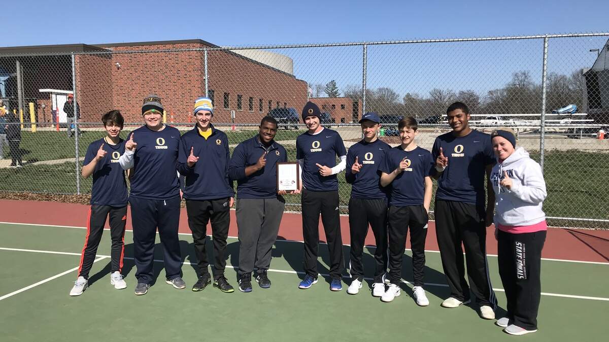 The OTHS boys tennis team shows off the plaque after winning the Triad Invitational Saturday at Triad High School. From left are Aidan Kiser, Hayden Lee, Niko Papachrisanthou, Quincy Dollison, Dominic Macaluso, Noah Kellermann, Evan Potter, Josh Collins, and head coach Erin Thoman.