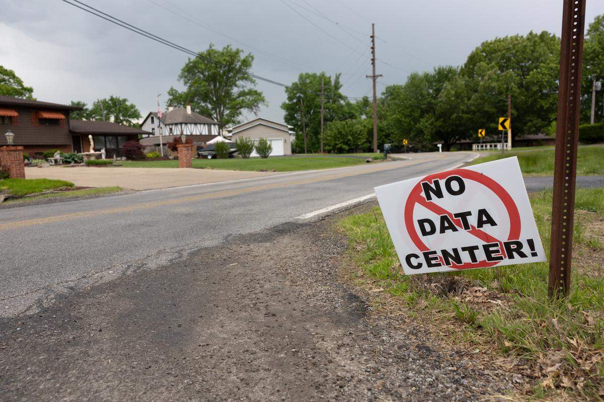 Along Illinois 3 and in the surrounding neighborhoods of Granite City, signs reading “No data center” can be seen by the road and in front yards.
