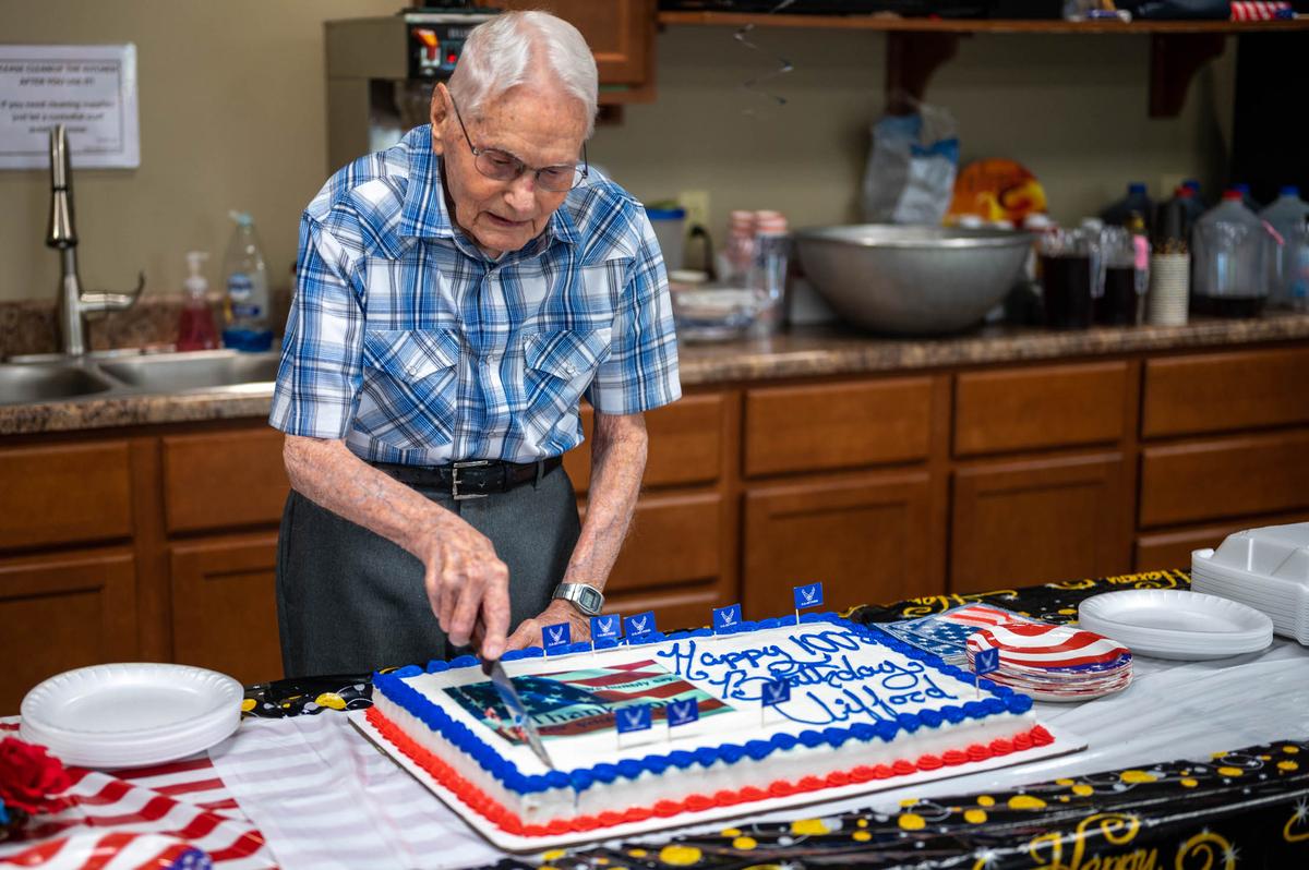 Clifford Good, World War II veteran, cuts a cake during his birthday celebratory luncheon Aug. 28 at the First Baptist Church in O’Fallon. Good celebrated his 100th birthday with a delicious meal, a well-deserved piece of birthday cake and recalling memories of the time he spent serving in the Second World War.