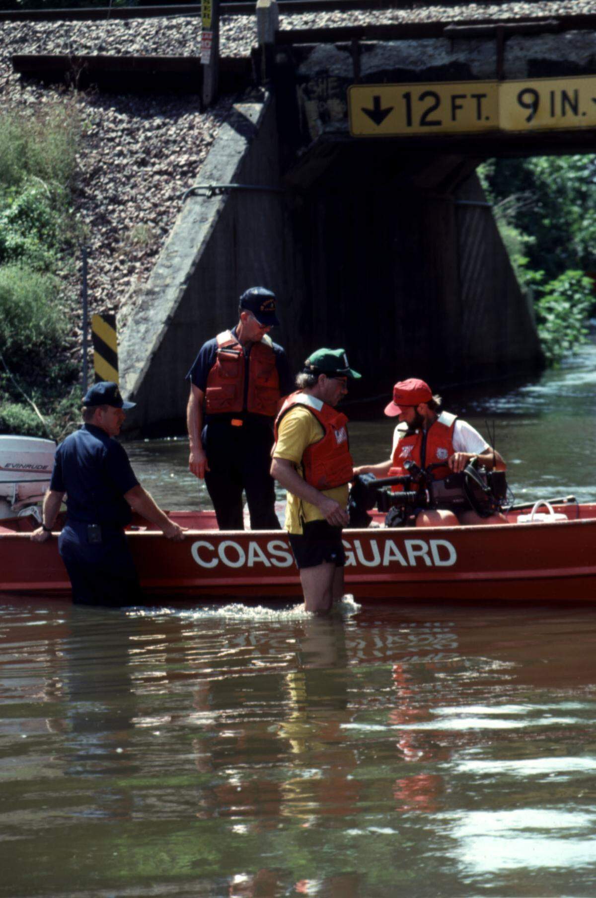 Flood victims are being taken to safe ground after their homes flooded out during the great 1993 Midwest Flood on July 7, 1993.