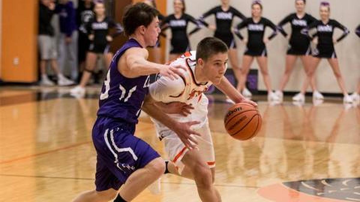 Nate Brede moves around a Central defender in a game during the 2017-2018 season.