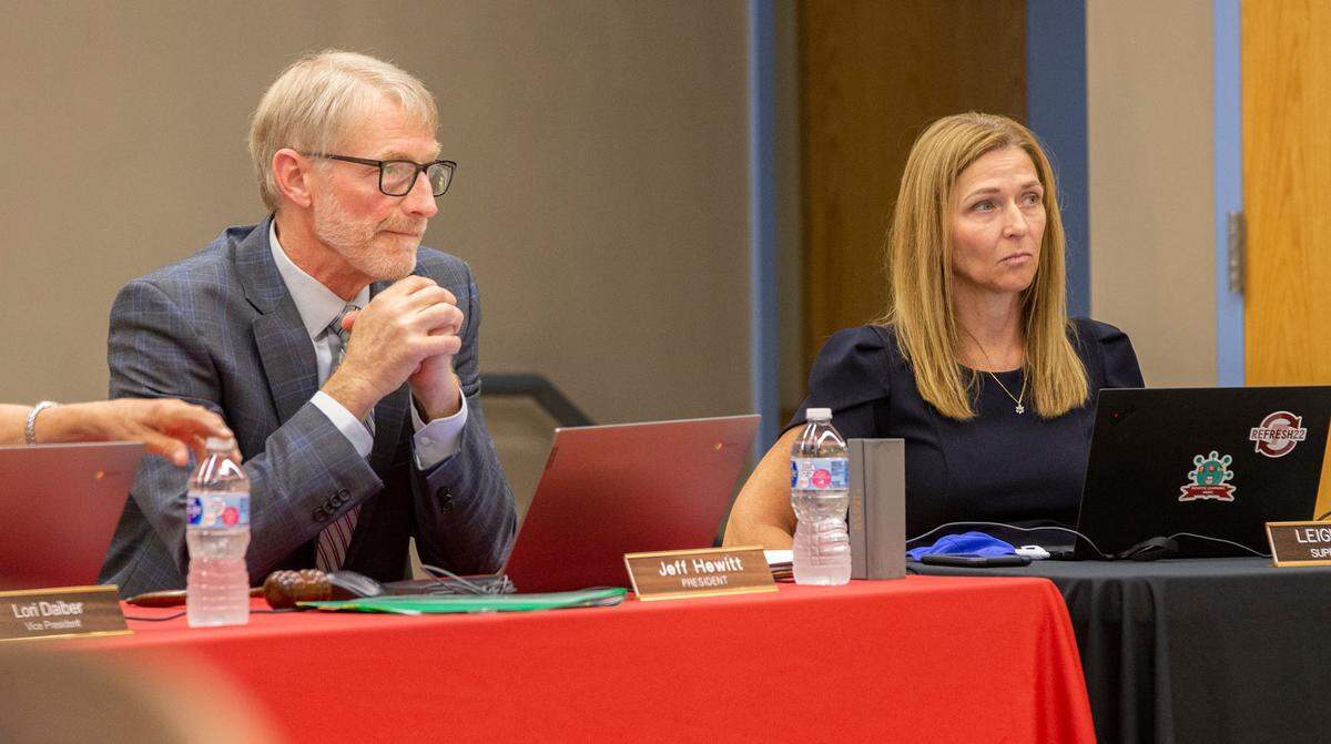 Jeff Hewitt, board president for Triad Community Unit School District 2, and Superintendent Leigh Lewis are shown during a recent meeting in Troy.