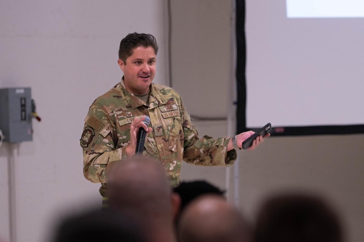 U.S. Air Force Col. Vincent Livie, 375th Operations Group commander, gives a safety briefing on the first day of Ballistic Badger 2022 on Volk Field Air National Guard Base, Wisconsin. BB22 is a training opportunity for Airmen at the Showcase Wing to rehearse the ability to execute rapid global mobility.