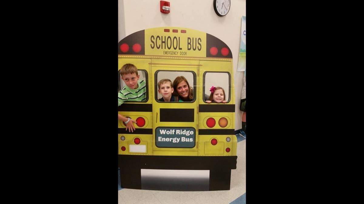 Stephanie Cann was principal at Wood Ridge Elementary School in Bunker Hill when she posed with students Patrick, Nicholas and Olivia Chapman.