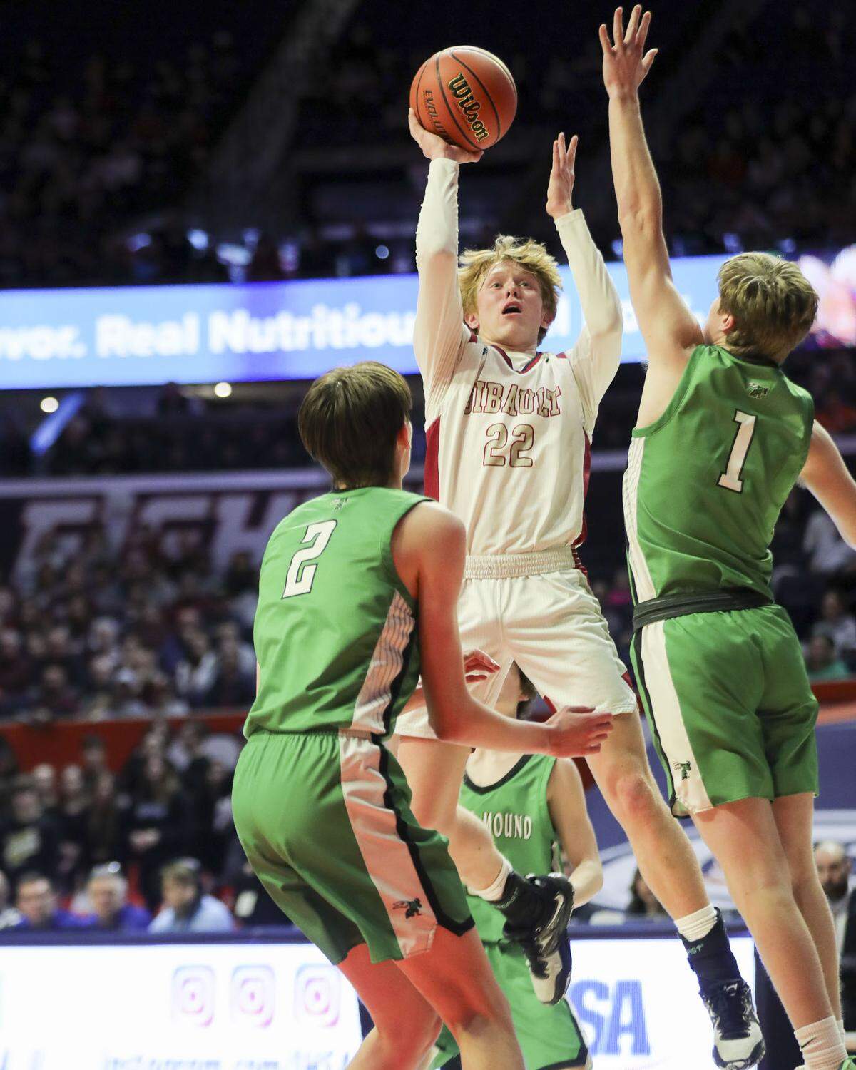 Gibault’s Hudson Blank attempts a shot during Saturday’s IHSA Class 1A state championship game against Scales Mounds at the State Farm Center on the campus of the University of Illinois. Gibault ultimately prevailed 65-45 to claim the state title.