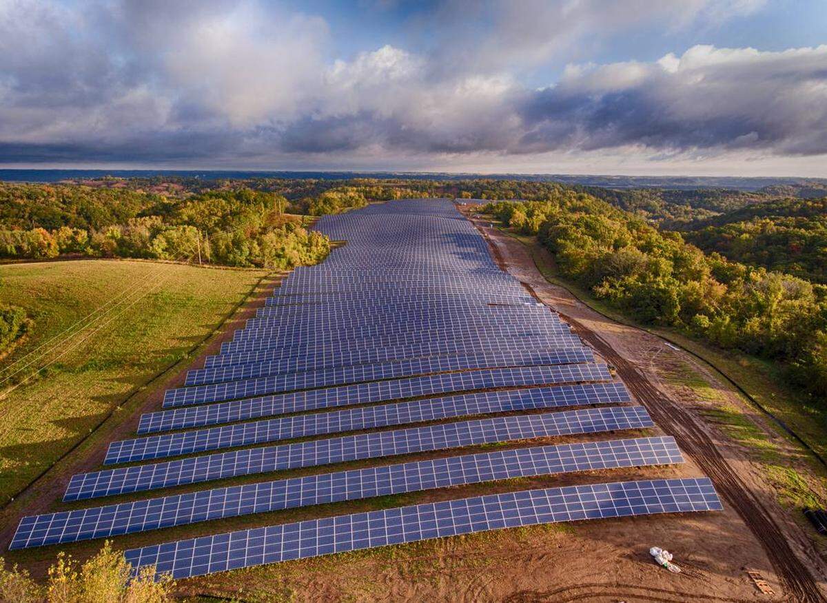 Instead of corn or soybeans, solar farms have rows of photovoltaic solar panels that convert radiant sunlight into electricity that can be transferred to the state’s power grid.