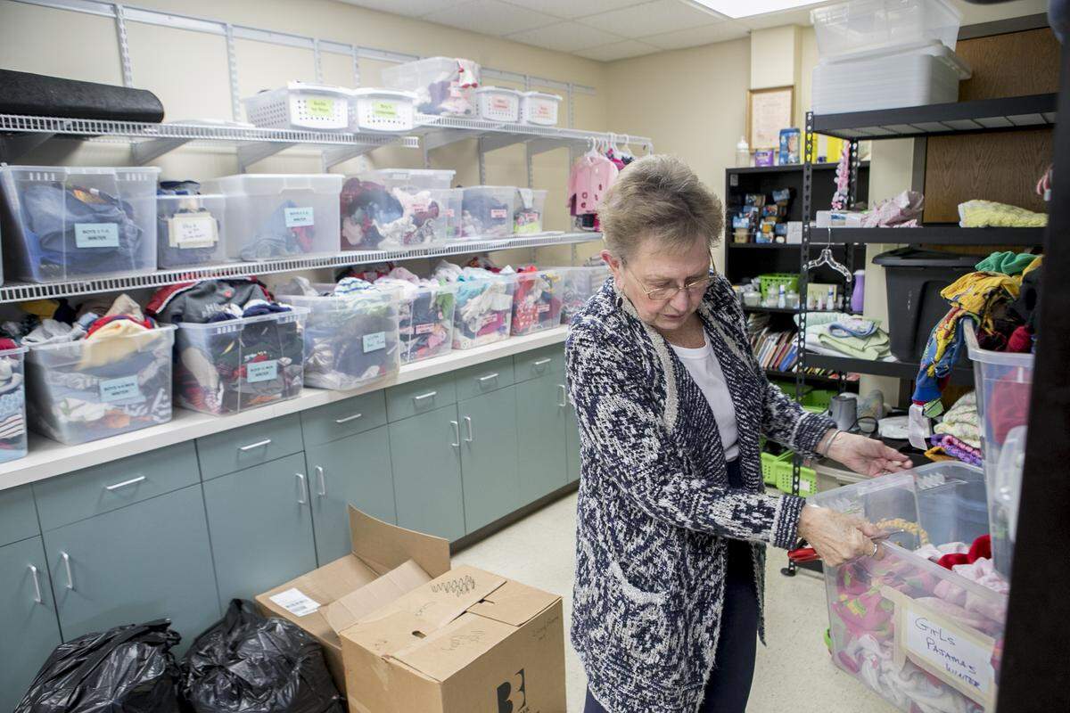 Pregnancy Care Center volunteer Gloria Schwartz looks through the clothing bins. The volunteer organization provides free services and supplies for new mothers with newborns up to 5. The group is known for their layettes, a bag full of supplies and clothing for new mothers. The volunteer organization has relocated to 180 S. Third St., Suite 50 in the medical office building.