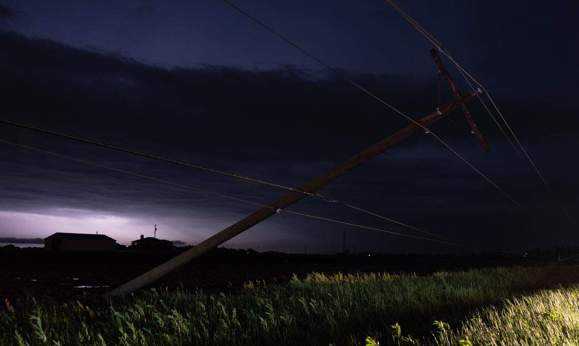 A downed utility poll on IL 160 between Trenton and New Baden, where a tornado blew through Monday night.