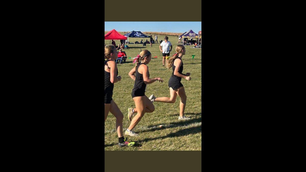 Highland cross country runners Tarryn Keeney, left, Elley Seger, center, and Lyla Rembisz compete in the three-mile race in the Mississippi Valley Conference girls championship meet Thursday at Principia College in Elsah.