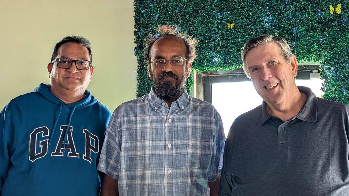 Schatze's Bar & Grill operator Ravi Yedla, owner Sri Anne, and entertainment manager Scott Boren