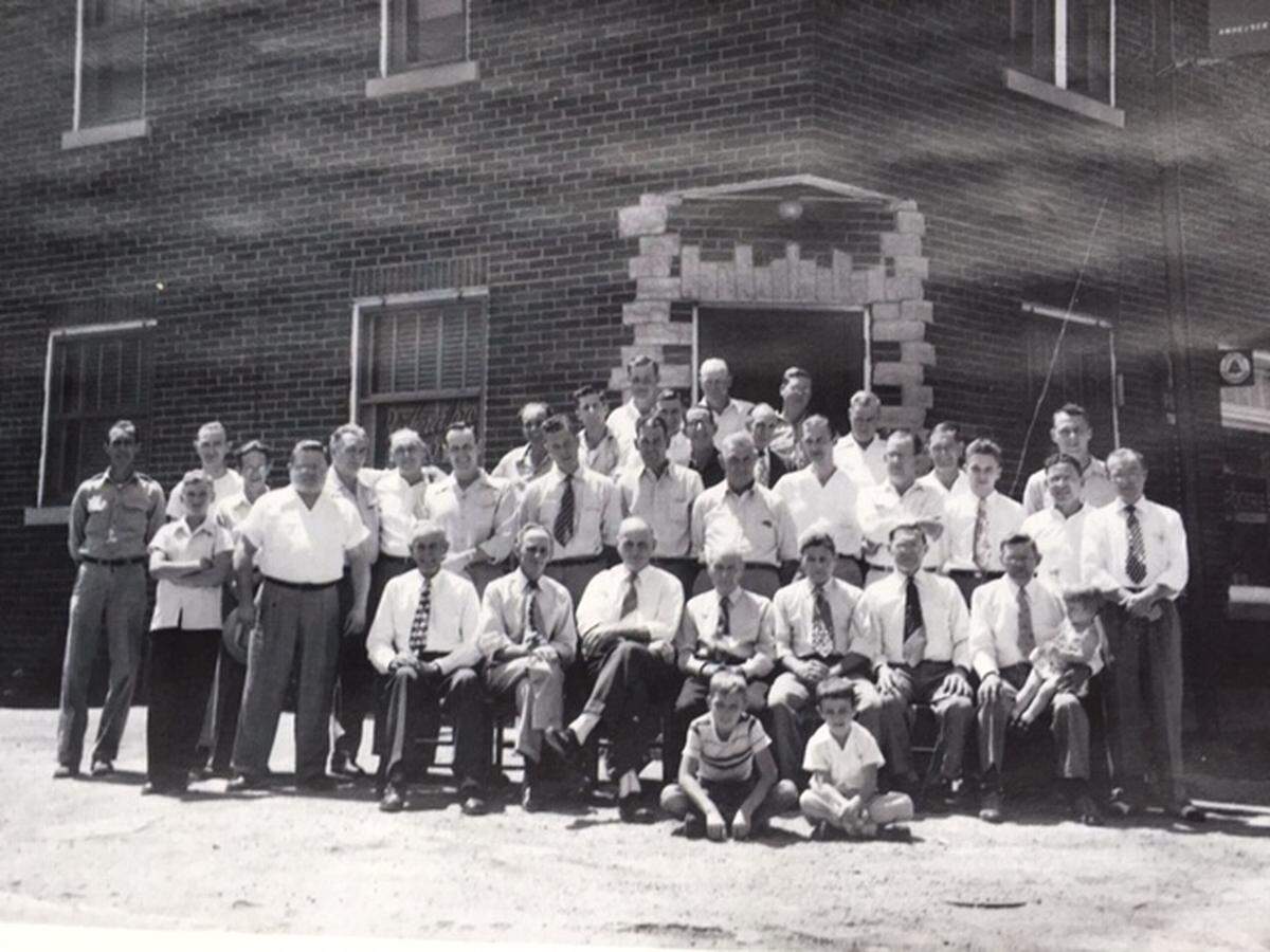 This photo from the late 1940s shows owners and customers of Becherer Bros. Tavern in what is now Fairview Heights. Bob Becherer is the boy in front with dark hair.