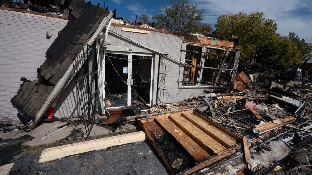 The remains of a burned down Cahokia Heights, Ill. convenience store on Oct. 18, 2023, on Camp Jackson Road. The fire department said the fire was reported at 2:25 a.m.