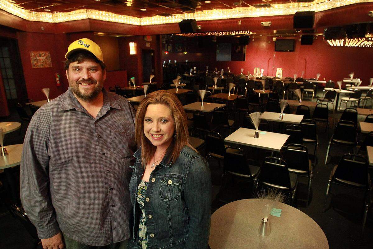 Bruce Veach and Shelbie Wohlstadter inside Hey Guys Comedy Club in Fairview Heights. The club is closing after four years in business.