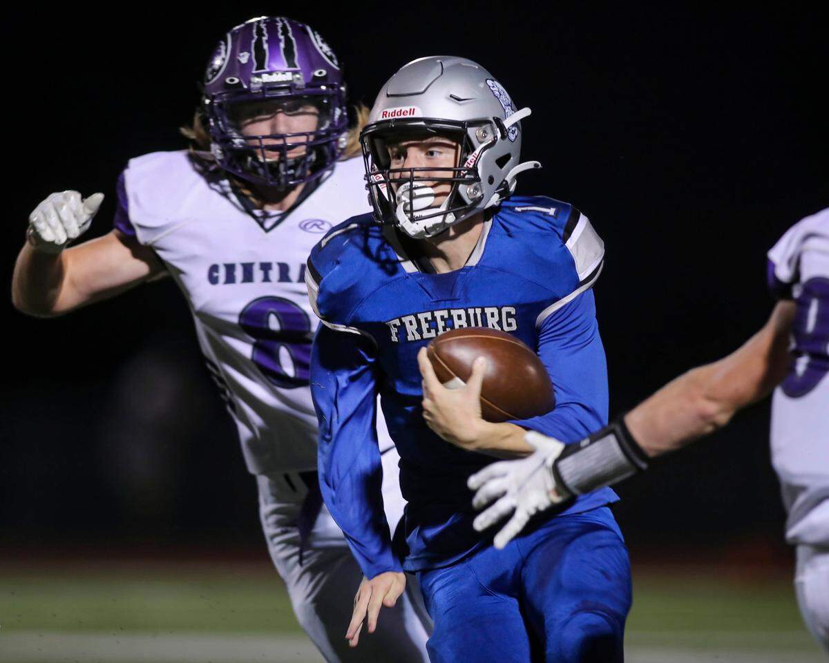 Freeburg’s Cole Stuart (1) carries the ball for a touchdown during against Breese Central in the Cahokia Conference opener for both teams Friday night. The Midgets ultimately fell to the Cougars 31-19.