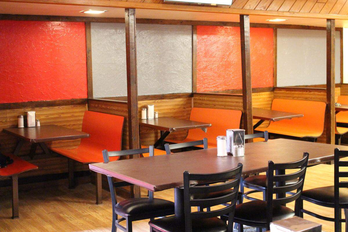 Orange booths line one wall of The Sandwich Shop Diner in Collinsville. The new owner plans to hang guitars and other memorabilia on walls to follow a 1950s theme.