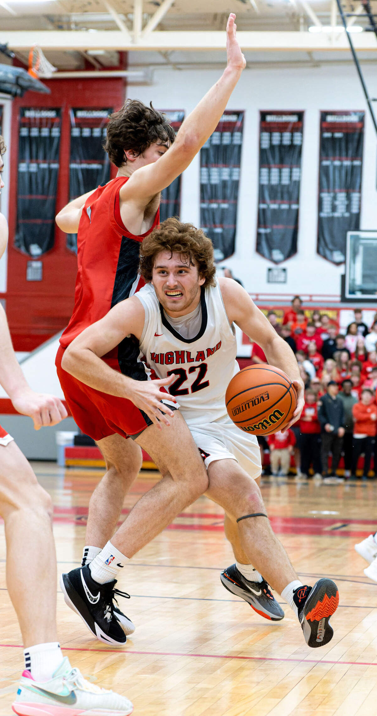 Highland’s Cade Altadonna drives to the basket during Friday night’s Mississippi Valley Conference game against Triad. The Knights ultimately posted a 50-37 victory.
