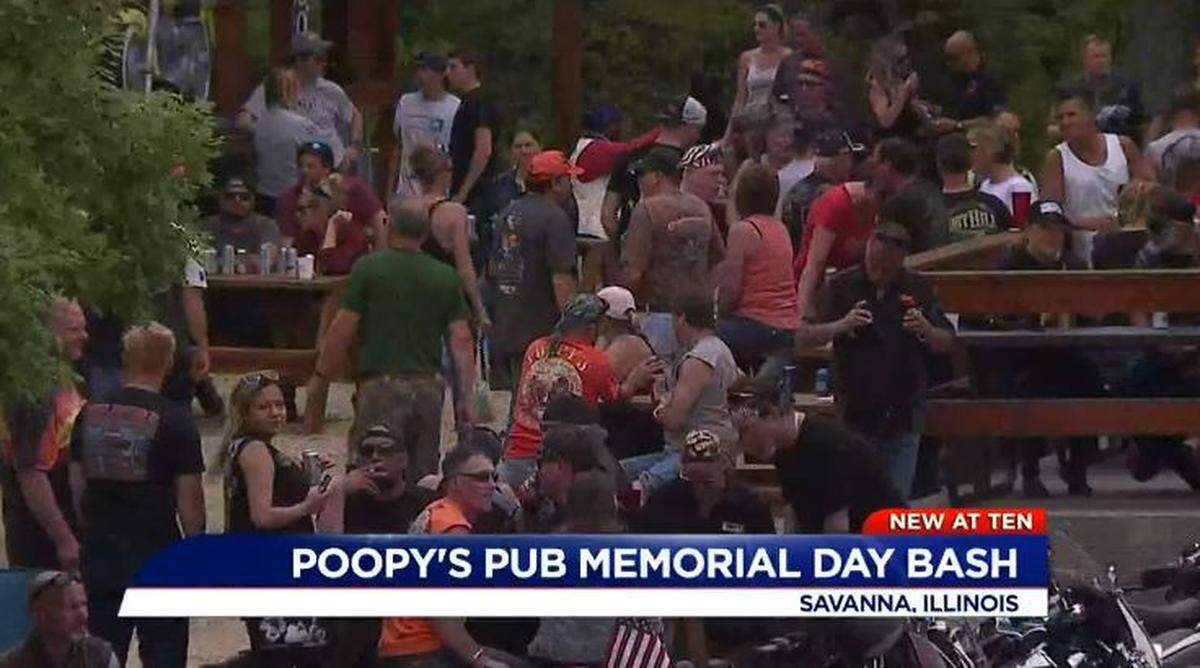 Hundreds of bikers packed Poopy’s Pub & Grub in Savanna, Illinois, over Memorial Day weekend as the bar fights state stay-home orders intended to curb the spread of the coronavirus.