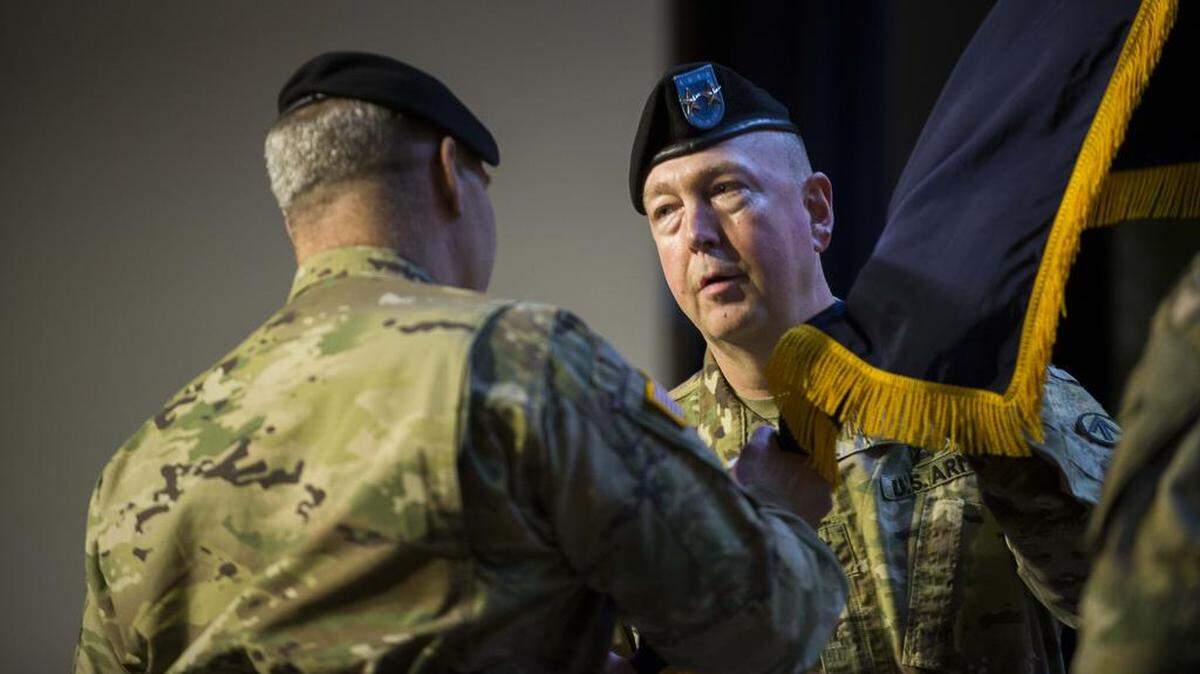 Army Maj. Gen. Stephen Farmen accepts command of the Military Surface Deployment and Distribution Command during a change of command ceremony Feb. 16 at Scott. SDDC, the Army Service Component Command of the U.S. Transportation Command, is the premiere surface transportation provider delivering and sustaining the joint force in peace and war. Prior to assuming command of SDDC, Farmen commanded the U.S. Army Security Assistance Command.