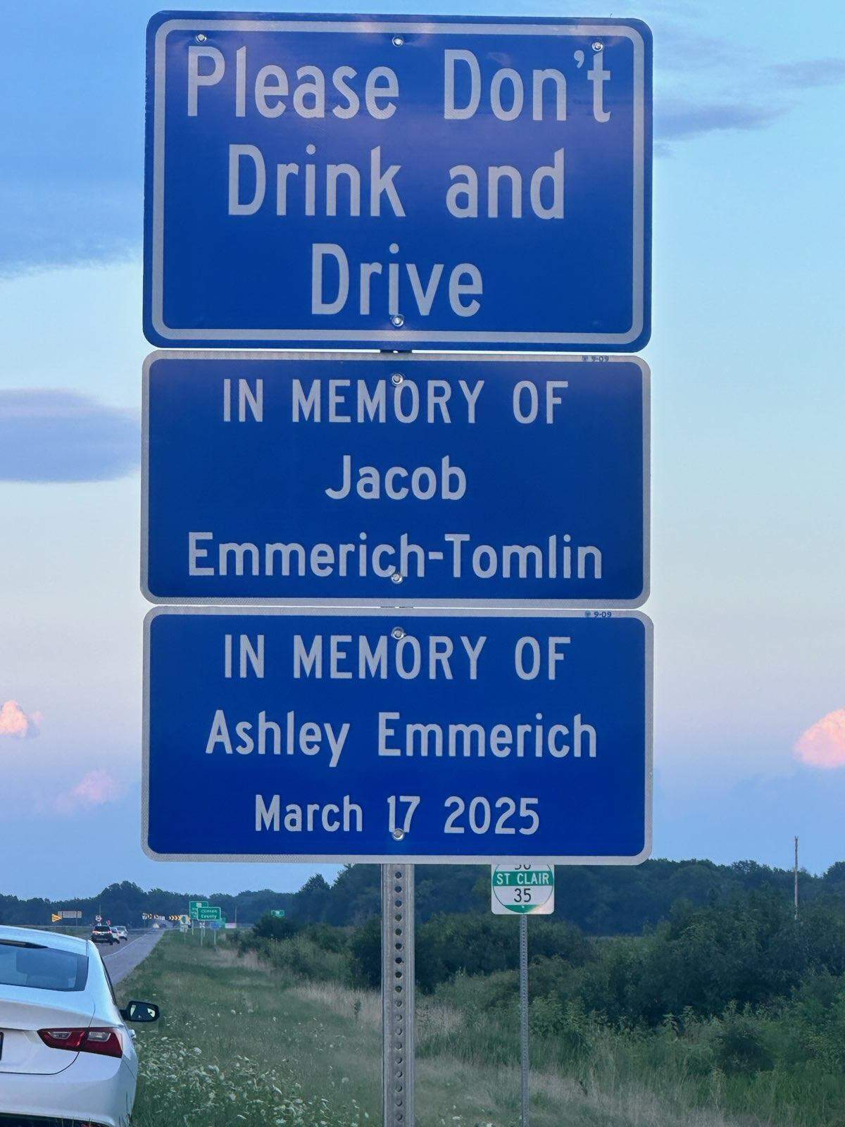 A sign at the scene of a St. Patrick’s Day crash that took the lives of three people.