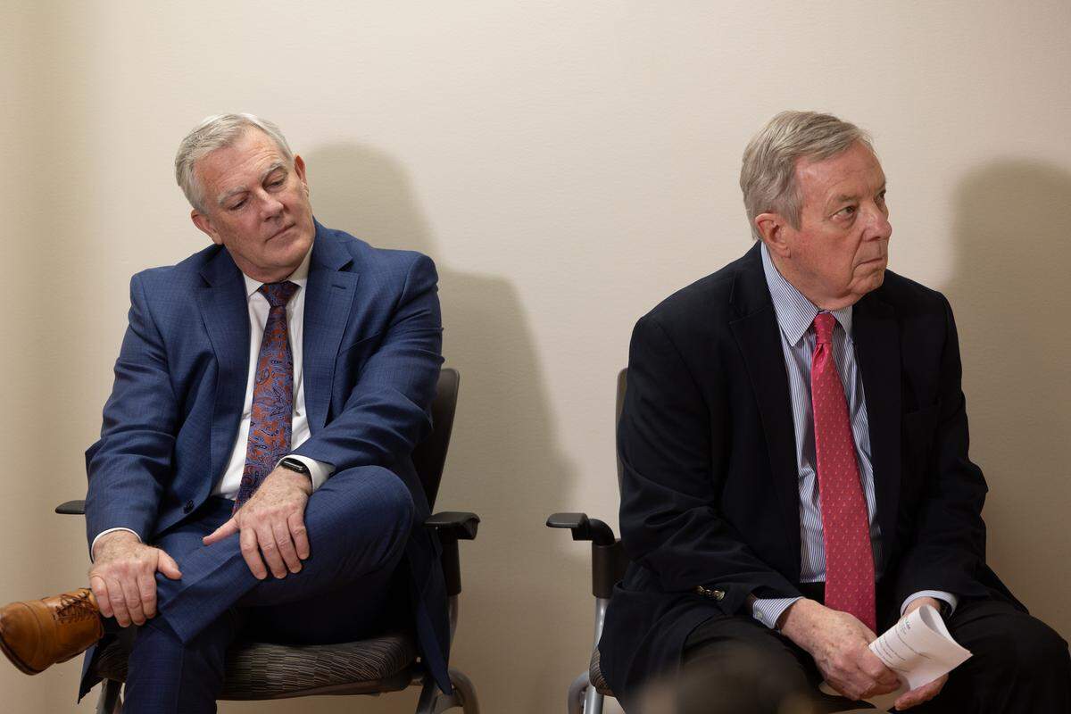 Larry McCulley, President and Chief Executive Officer and U.S. Senator Dick Durbin sit together during a news conference regarding the Trump’s administrations recent cuts to Medicaid and Medicare on Thursday.