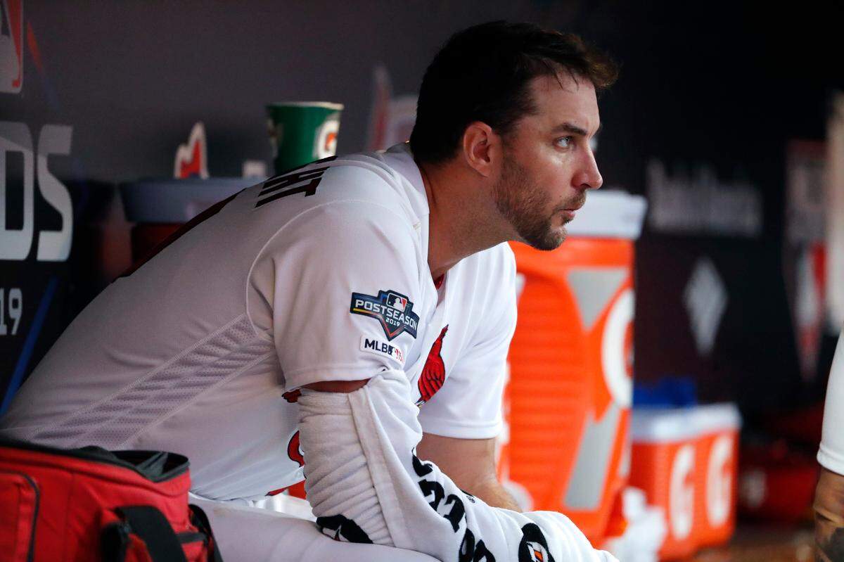 St. Louis Cardinals starting pitcher Adam Wainwright sits in the dugout during the seventh inning in Game 3 of the baseball team’s National League Division Series against the Atlanta Braves on Sunday, Oct. 6, 2019, in St. Louis. (AP Photo/Jeff Roberson)
