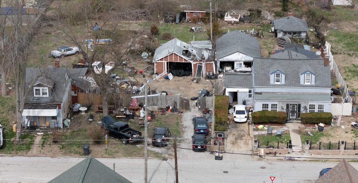 This drone image shows three parcels owned by George Green along South 19th Street in Belleville on Friday. Neighbors have complained about “junk” in the yards and allege that Green is illegally operating an auto-repair business in a residential neighborhood.