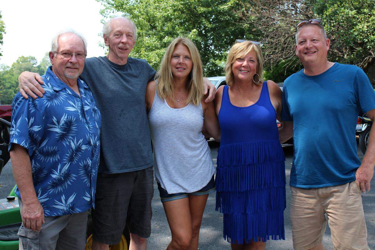 Five of the six siblings who have found each other through DNA testing include, left to right, Bob Robbins, Dennis Gathard, Ann Pilackas, Tracy Kuehn and Tom Clayton. Not pictured is Fred Clayton.