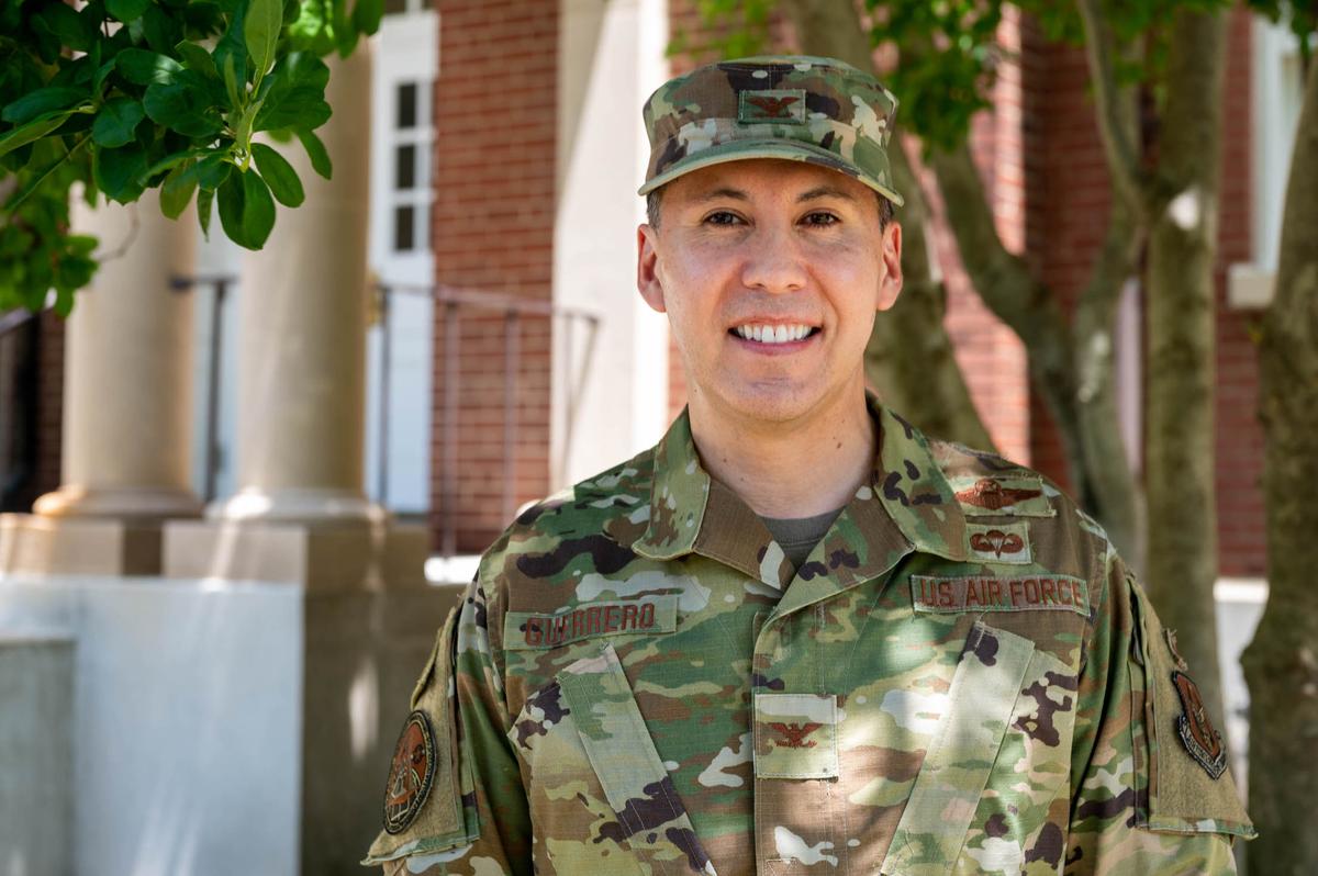 U.S. Air Force Col. Casey Guerrero, Air Mobility Command Directorate of Operations, Strategic Deterrence, and Nuclear Integration Reserve advisor to the director of operations, stands outside of AMC Headquarters on Scott Air Force Base. Like many in the LGBTQ+ community, Guerrero has witnessed the progression from being completely banned to now being able to openly serve as part of the Department of Defense’s stance on diversity and inclusion.