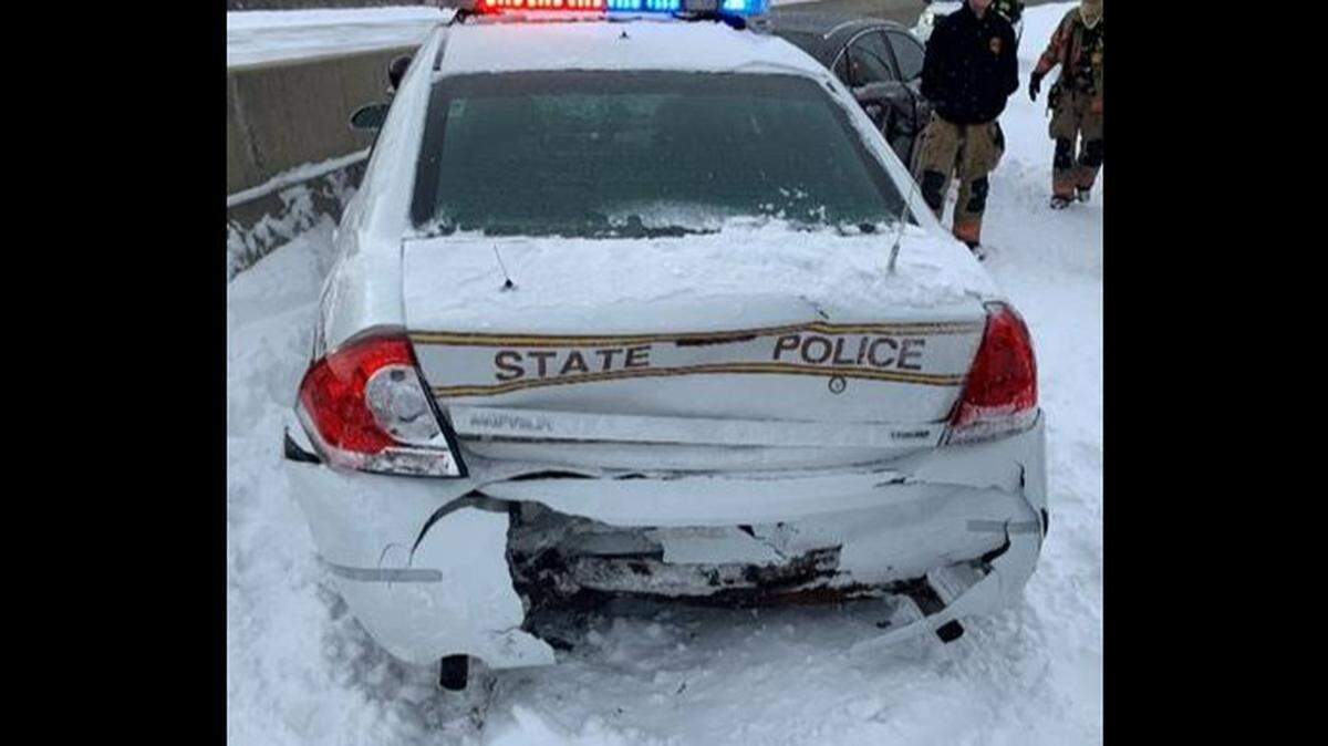 Three state troopers struck while working on icy highways during winter storm