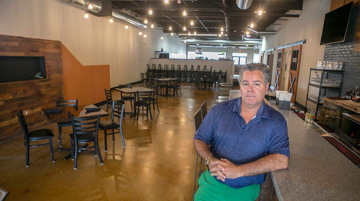 Cured and Cultured owner Adam Hill opened his business at 6401 W. Main St. in Belleville earlier this year.