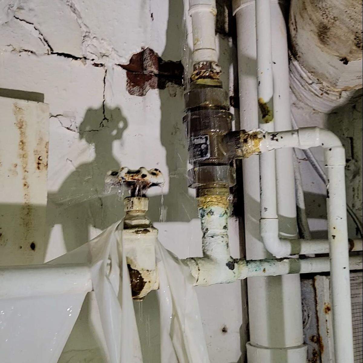 Screenshots from a video show leaky pipes and generally filthy conditions in what a source identified as the embalming room of the Moran Queen-Boggs Funeral Home in Centralia. The source who provided the video requested anonymity due to safety concerns. The funeral home’s director, Hugh Moran, would not confirm its authenticity.