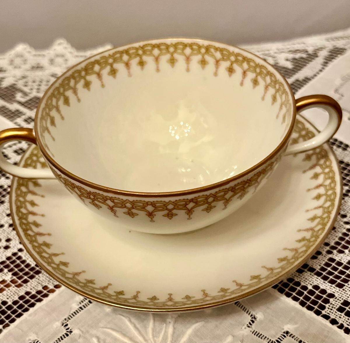 This bouillon cup and saucer is 4-1/2” in diameter and 2” in depth, with a matching saucer of typical size of&nbsp;5-1/2“.