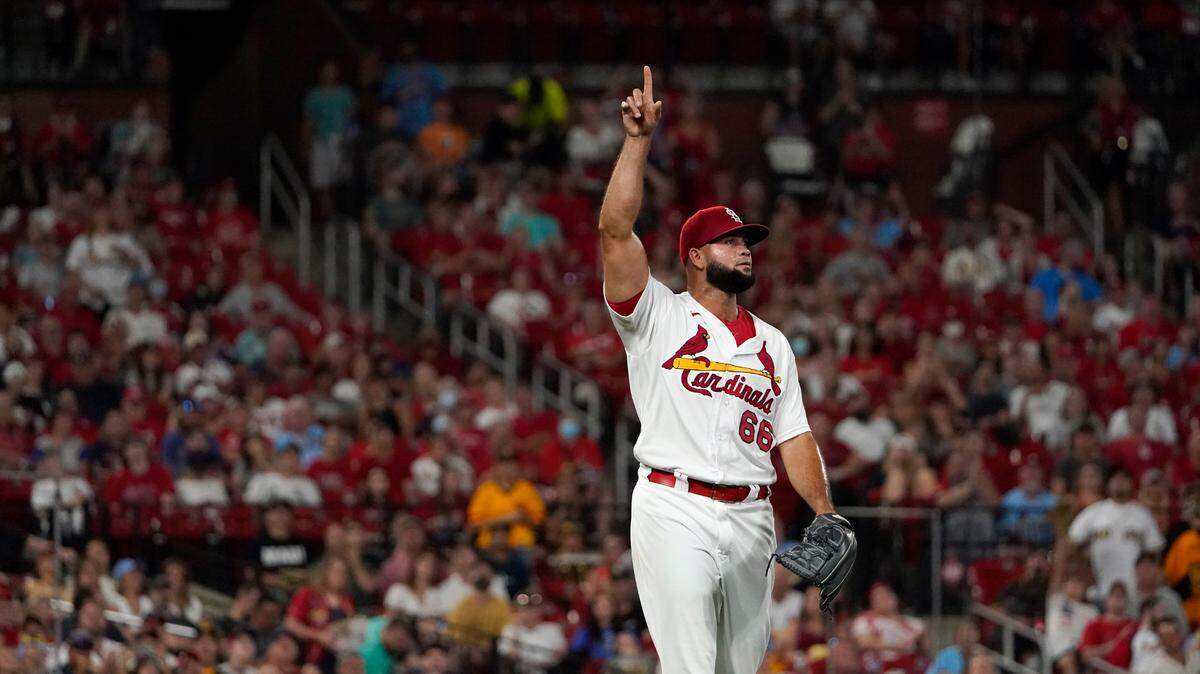 St. Louis Cardinals relief pitcher Luis Garcia points to a pop up by San Diego Padres’ Fernando Tatis Jr. for an out to end the top of the seventh of a baseball game Friday, Sept. 17, 2021, in St. Louis. (AP Photo/Jeff Roberson)