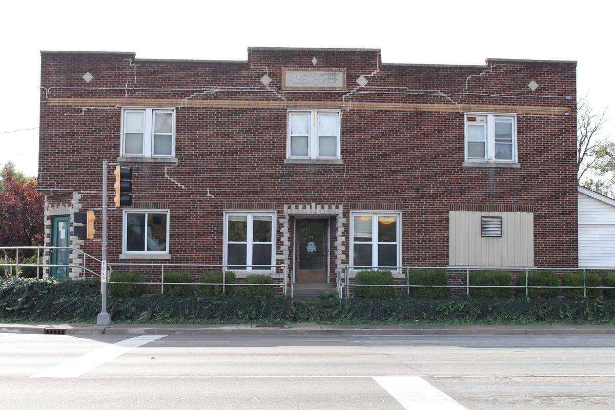 The two-story brick building on the southwest corner of Lincoln Highway and Old Collinsville Road was built in 1933 by the Becherer family, whose name appears on the front.