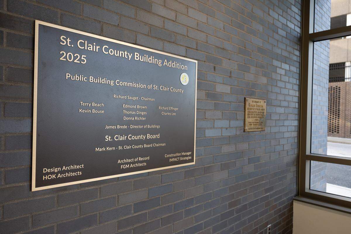 A plaque is hung in the vestibule of the new lobby within the St. Clair County Courthouse.