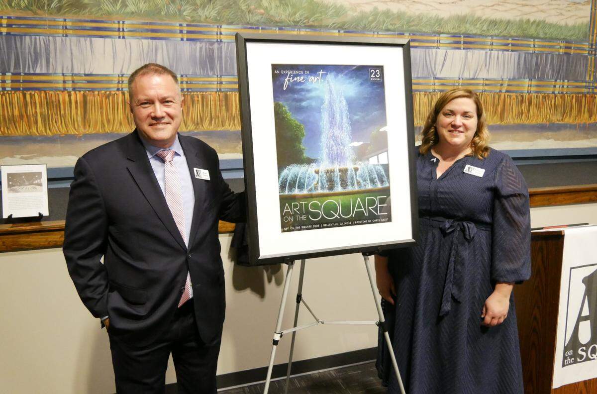 Belleville business owners Karl Gilpin and Rebecca Boyer, co-directors of Art on the Square, unveil the art fair’s commemorative poster in 2025. They’re now gearing up for their second year.