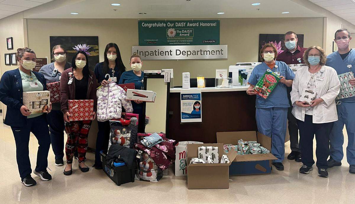 HSHS St. Joseph’s Hospital Highland colleagues generously donated gifts to support eight local families in need this holiday season. Each year the hospital’s mission team coordinates families to provide for through the Highland Area Christian Service Ministry. Pictured with some of the donated items are, from left, Kortnie Henkel, CNA; Britney Cushing, CNA; Kortney Hohmeyer, RN and case manager; Rachael Ray, RN; Lyndsey Gelly, RN; Anita Whittington, pharmacist; Joel Tucker, director of pharmacy; Blanch Small, pharmacy technician; and Abe Barth, pharmacist. For more information about HSHS St. Joseph’s Hospital Highland, visit the hospital’s website at stjosephshighland.org.
