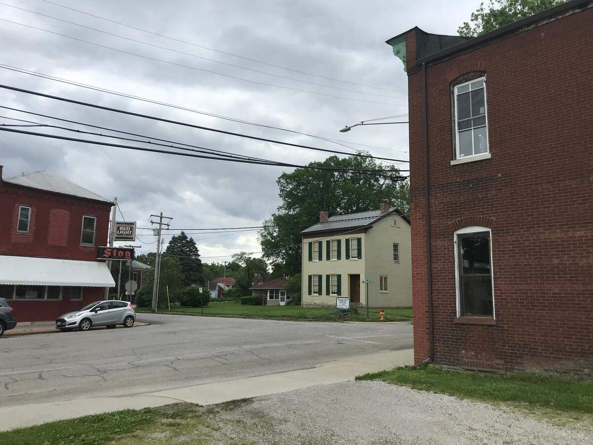 This photo shows the proximity of the 1854 Gustave Koerner House, center, to another historic Belleville building being considered for renovation, right. Across the street is the former Charlie’s Off Main bar and restaurant.