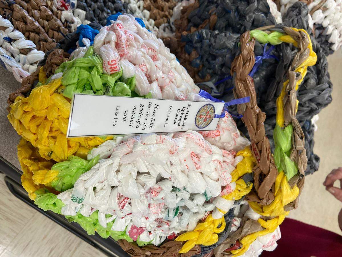 Volunteers at St. Michael’s Episcopal Church in O’Fallon gather Thursday mornings to prepare mats that are given to people who are houseless. Pictured is the efforts one Thursday morning, with a tag from the church.