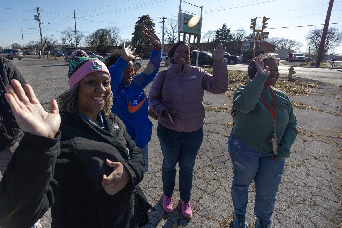 Loved ones and supporters of the Flyers gather along the parade route to cheer as the champions made their way through East St. Louis.