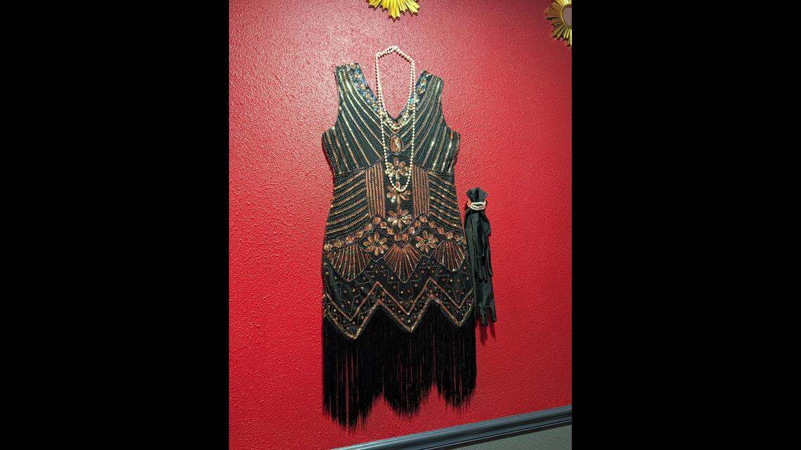 This flapper dress is the inspiration for the Belleville Stein Haus' speakeasy design. The dress hangs in the ladies restroom of the new restaurant and bar.